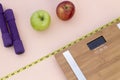 Still Life photography with apples, weight tape measure and a scale Royalty Free Stock Photo
