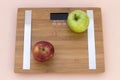 Still Life photography with red and green apple and a scale Royalty Free Stock Photo