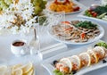 Table setting with light fish and meat snacks Royalty Free Stock Photo