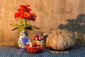 Still Life - pumpkin, dried chilli, shallots, and garlic Royalty Free Stock Photo