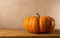 Still life of pumpkin on wooden table. Concept autumn harvest food