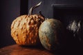 Still life with pumpkins. Small pumpkins on the window. Thanksgiving day background. Autumn harvest. Halloween gourd decoration. Royalty Free Stock Photo