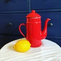 Background  poster - still life with red coffee pot and lemon Royalty Free Stock Photo