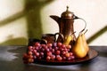 Still life of red grapes and bosc pears Royalty Free Stock Photo