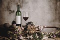 Still life of red wine bottle and wine glass Royalty Free Stock Photo