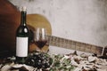 Still life of red wine bottle and wine glass Royalty Free Stock Photo