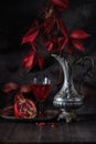 Still life red wine in vintage jug Royalty Free Stock Photo