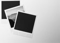 Still life retro vintage three instant photo frames cards on white background with a photo of landscape in black and white