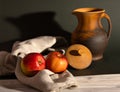 Still life in a rustic style: red apples and a pitcher Royalty Free Stock Photo