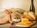 Still life with sausage cheese and bread Royalty Free Stock Photo