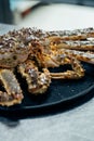 Taraba sea crabs or alaska king crab on black plate Royalty Free Stock Photo