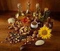 Still life of seeds and oils useful for health (Flax, sesame, sunflower, olives, walnut, peanuts