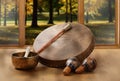 A still life of the shamanic drum, Tibetan singing bowls and maracas Royalty Free Stock Photo