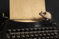 Still life with siamese mice on a typewriter and phone making contact and communicating