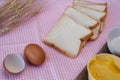 Still life with sliced bread,egg,flour,magarine and wheat on tab Royalty Free Stock Photo