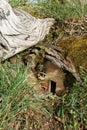 Small wooden fairy house in the forest, close-up Royalty Free Stock Photo