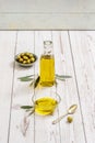 A still life of Spanish virgin oil bottles with olive leaves Royalty Free Stock Photo