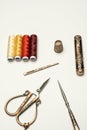 A still life with spools of colored thread with a white measuring tape, Royalty Free Stock Photo