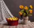 Still life of sunflowers and apples Royalty Free Stock Photo