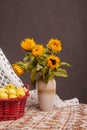 Still life of sunflowers and apples Royalty Free Stock Photo