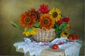 Still life with sunflowers in a basket with embroidered flowers on a towel Royalty Free Stock Photo