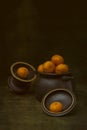 Still life with tangerines and kitchen utensils Royalty Free Stock Photo