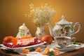 Still life with tea, cake, tangerines and red currant Royalty Free Stock Photo
