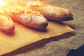 Still life with three French fresh bread baguettes with poolish Royalty Free Stock Photo