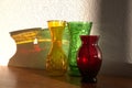 Still Life of three glass vases with sunlight. Royalty Free Stock Photo