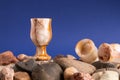 Still life with three onyx glasses on a pile of pebble Royalty Free Stock Photo