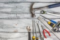 Set of construction tools on the white,rustic wooden background Royalty Free Stock Photo