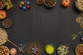 Still life top view of nuts, chocolates, olive leaves, orange juice, hazelnuts, Royalty Free Stock Photo