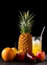 Still life tropical fruits and glass of juice Royalty Free Stock Photo