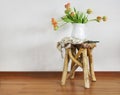 Still life with tulips bouquet on wooden rustic chair Royalty Free Stock Photo
