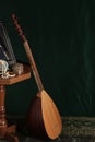 Still life in turkish Muslim ottoman oriental style. Turkish national musical instrument baglama saz, jewelry box and mirror on