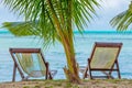 Still life of two sun chairs on beach of Carp Island Royalty Free Stock Photo