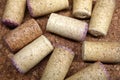 Still life with used wine corks on cork background top view close up Royalty Free Stock Photo