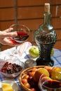 Still life on the veranda a light lunch with wine in the summer afternoon, in the south of Russia. Wine tasting.