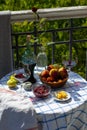 Still life on the veranda a light lunch with wine in the summer afternoon, in the south of Russia. Wine tasting.