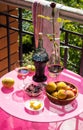 Still life on the veranda a light lunch with wine in the summer afternoon, in the south of Russia. Wine tasting.