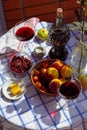 Still life on the veranda a light lunch with wine in the summer afternoon, in the south of Russia. Wine tasting.