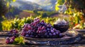 Still life with vintage decanter, glass filled with red wine fresh and ripe large violet grapes on antique silver platter Royalty Free Stock Photo