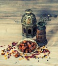 Still life with vintage oriental lantern and mill. Royalty Free Stock Photo