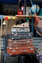 Still life of vintage suitcases, chess, books at the festival `Bright people` in the City Day in Moscow.