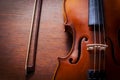 Still life violin on wood table.