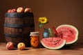 Still life, watermelon, flowers and peaches Royalty Free Stock Photo