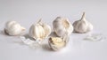 - still life, white garlic on a white background. Royalty Free Stock Photo