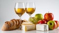 Still life with white wine, cheese, bread, and fresh fruit Royalty Free Stock Photo