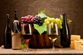 Still life with wine bottles, glasses and grapes Royalty Free Stock Photo