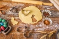 Still life on a wooden background. Preparation for Easter baking. Figured forms for cookies.